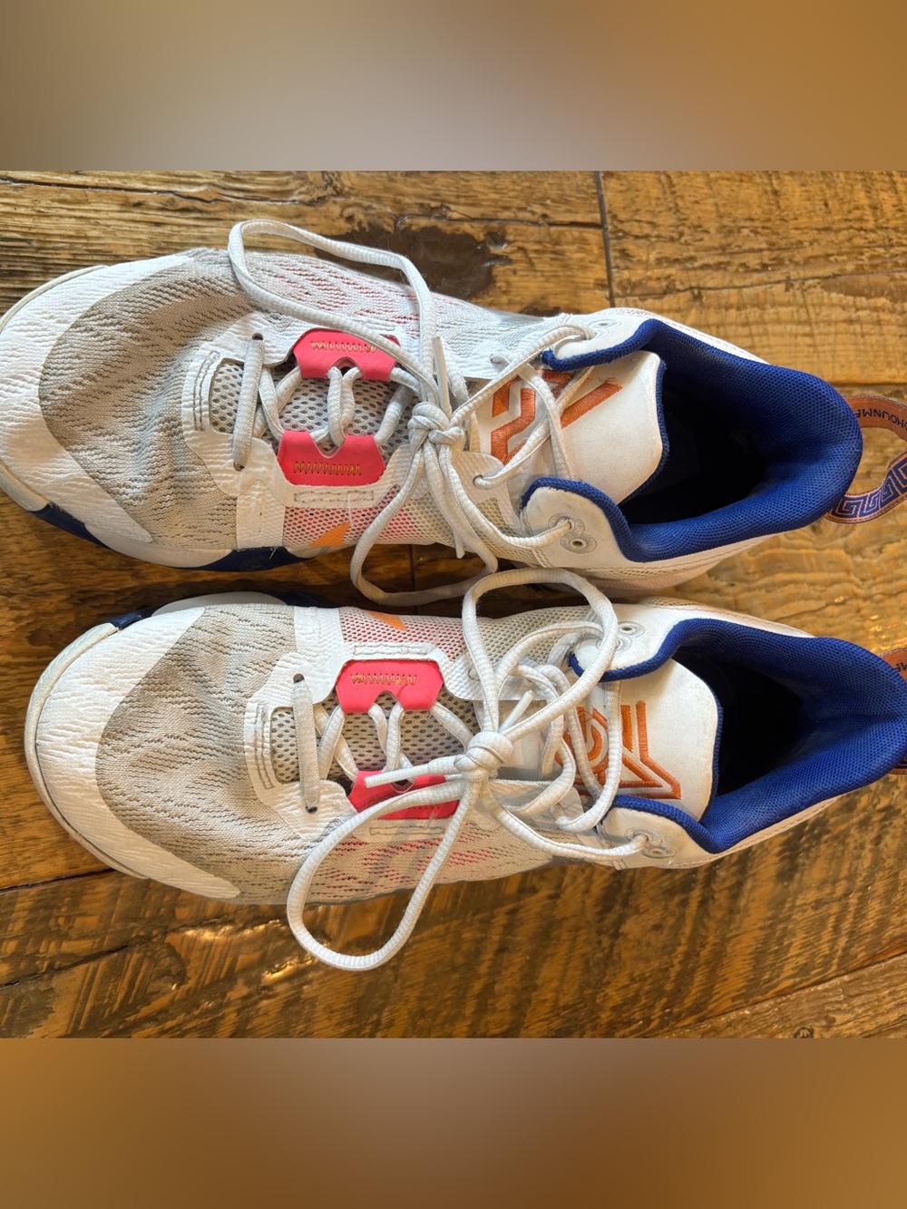WomensWhite and Blue nike basketball/court shoes with Pink Accents
